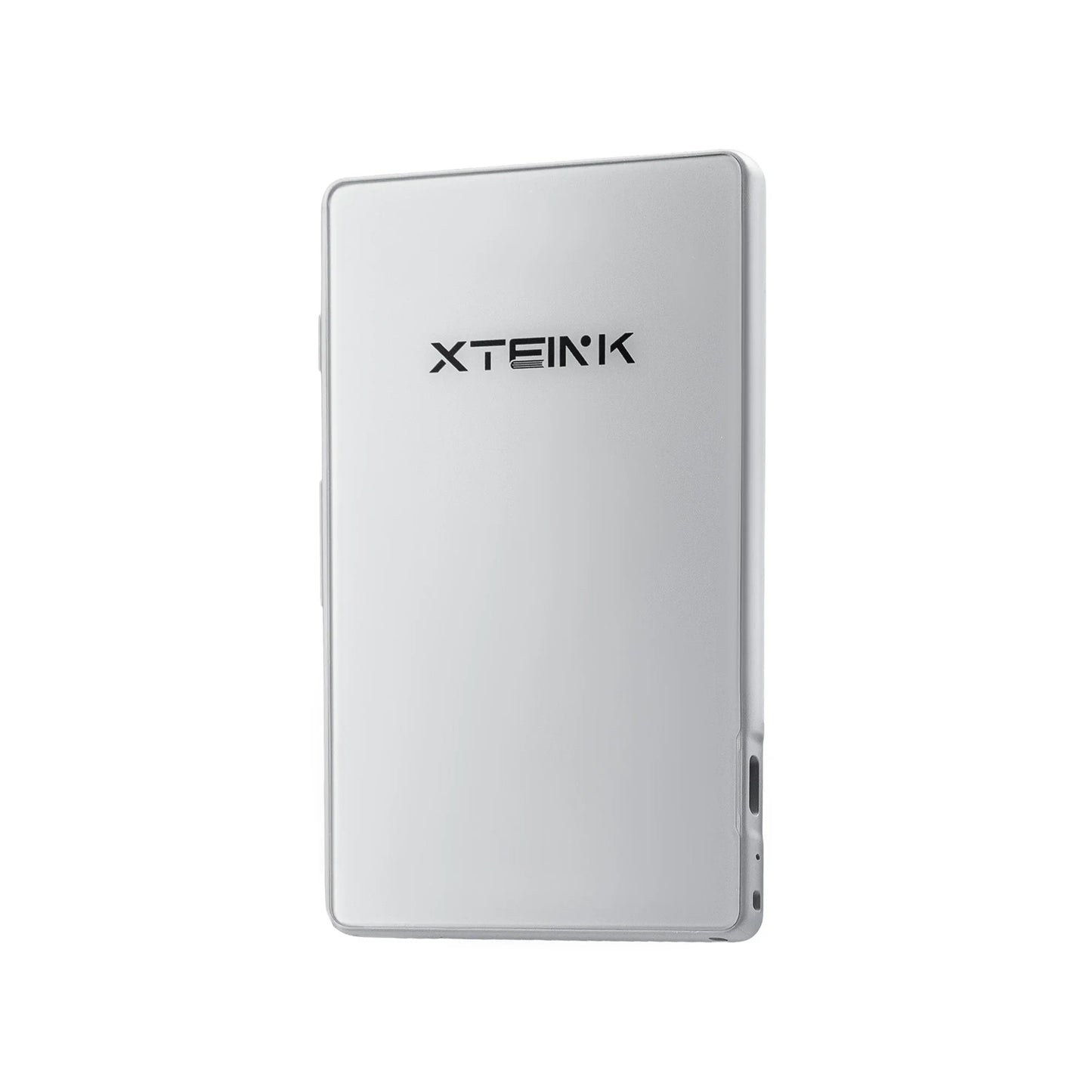 Silver Xteink eReader back view, ultra-thin lightweight design for portable reading