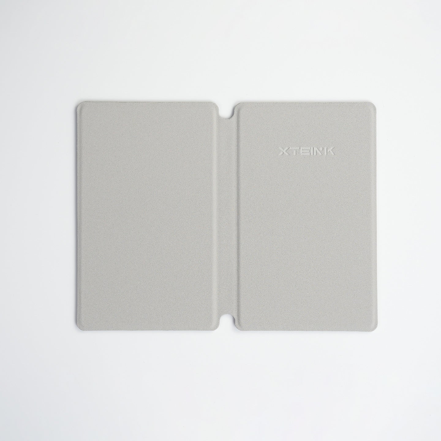 Gray Xteink eReader case with minimalist design and embossed branding